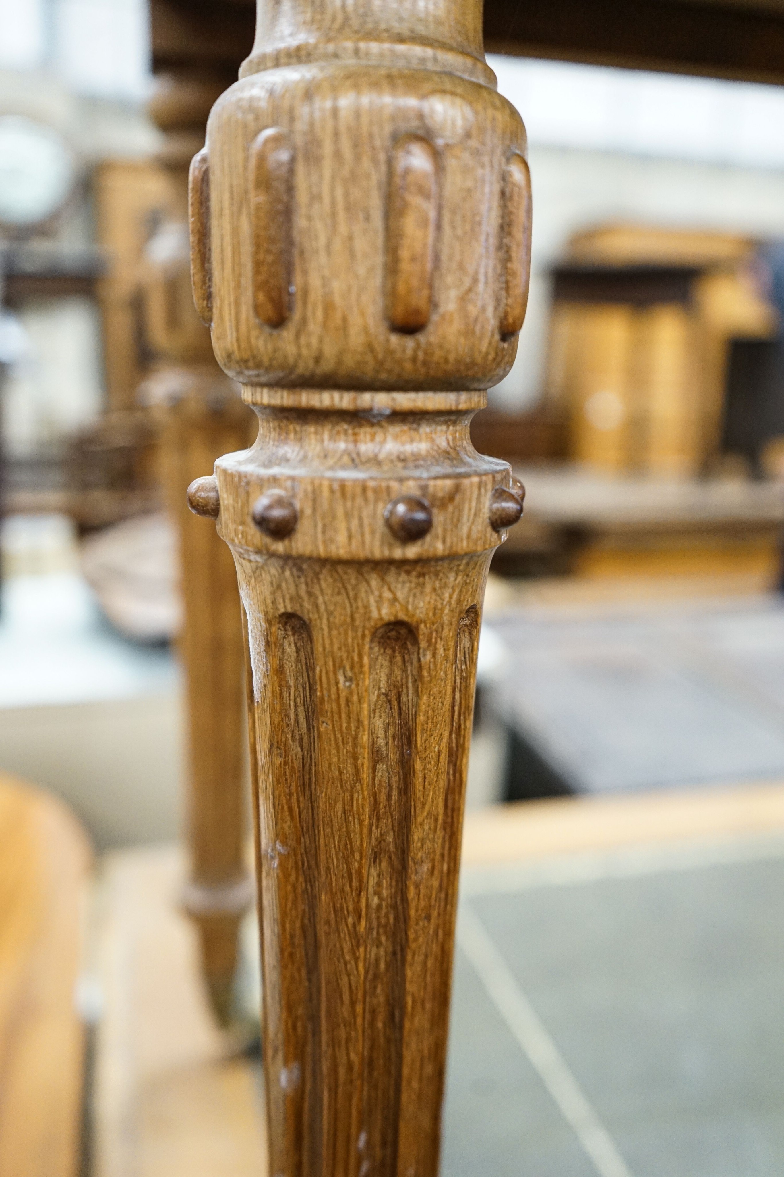 A Victorian golden oak side table, with single drawer, turned and fluted legs on brass castors, width 68cm, depth 46cm, height 73cm